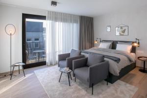 Voodi või voodid majutusasutuse Qstay Good Living Apartments toas