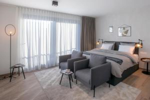 Voodi või voodid majutusasutuse Qstay Good Living Apartments toas