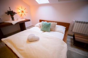 Posteľ alebo postele v izbe v ubytovaní Apartament Dwupoziomowy Nad Tamami