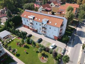 an aerial view of a house with a yard at MyFlat Siófok Beach Wellness Apartment in Siófok