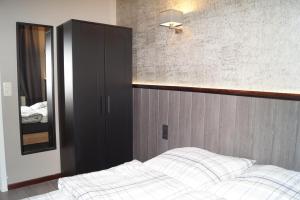 Un pat sau paturi într-o cameră la Classy apartment at European Quarter 2