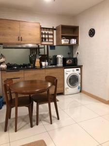 Kuchyň nebo kuchyňský kout v ubytování TimurBay Residence by Onehomes