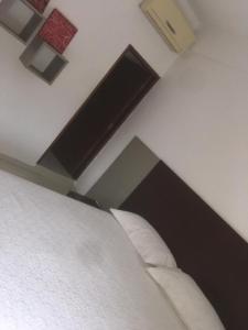 Una cama o camas en una habitación de Sibaris