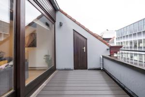 A balcony or terrace at Functional housings 2 steps from Grand Place