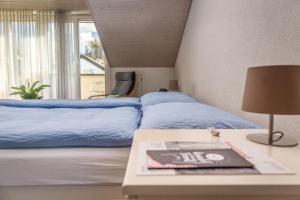 Letto o letti in una camera di MyBednBreakfast in Bottmingen