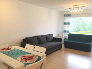 Posezení v ubytování Advice & Advise Apartment