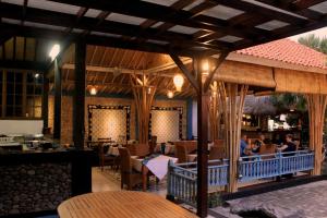 Restaurace v ubytování Mans Cottages & Spa