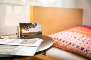 Letto o letti in una camera di MyBednBreakfast in Bottmingen