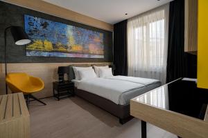 Postel nebo postele na pokoji v ubytování Maccani Black Luxury Suites
