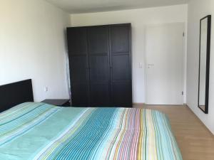 Postel nebo postele na pokoji v ubytování Advice & Advise Apartment