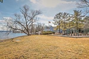 a park with a playground next to the water at Williams Bay Retreat Walk to Lake Geneva and Town! in Lake Geneva