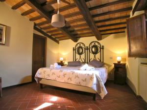 Cama o camas de una habitación en Serre di Parrano