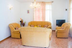 Posezení v ubytování La Caverna House