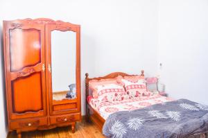 Postel nebo postele na pokoji v ubytování La Caverna House