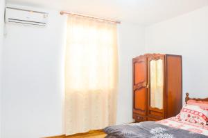 Postel nebo postele na pokoji v ubytování La Caverna House