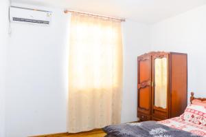 Postel nebo postele na pokoji v ubytování La Caverna House