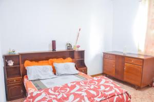 Postel nebo postele na pokoji v ubytování La Caverna House