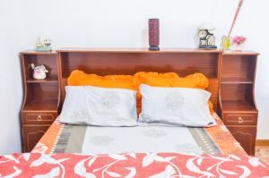 Postel nebo postele na pokoji v ubytování La Caverna House