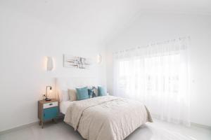 Postel nebo postele na pokoji v ubytování Villa Dreams