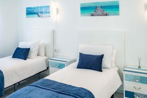 Postel nebo postele na pokoji v ubytování Villa Dreams
