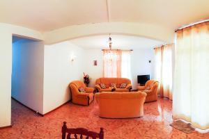 Posezení v ubytování La Caverna House