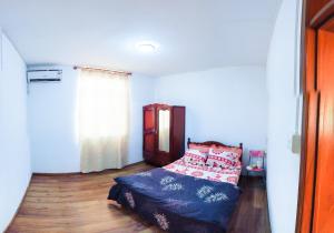 Postel nebo postele na pokoji v ubytování La Caverna House