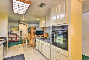A kitchen or kitchenette at Sandford Vacation Rental Near Airport and Lake!