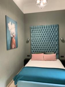 Ένα ή περισσότερα κρεβάτια σε δωμάτιο στο Fountain Appartement