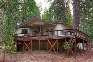 a house in the middle of a forest at 25A Villarreal Retreat in Wawona