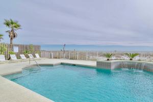 The swimming pool at or close to Beachfront Gulf Shores Condo with Patio, Pool Access