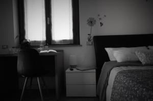 Postel nebo postele na pokoji v ubytování ValpoHome&Rooms