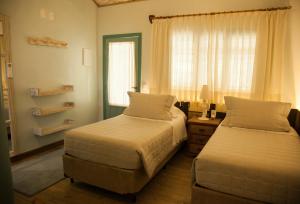 Uma cama ou camas num quarto em Templo Do Ser