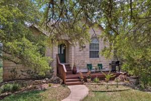 a house with a porch with two chairs on it at 2 Furnished Decks and Lake Views Austin Escape in Austin