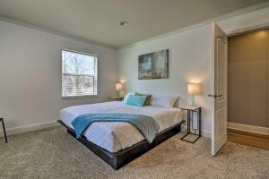 a bedroom with a bed and a window at Comfortable Ranch Home - 5 Mi to Downtown Atlanta! in Atlanta