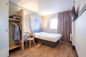 Voodi või voodid majutusasutuse B&B HOTEL Dunkerque Centre Gare toas