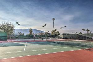 a tennis court with two tennis nets on it at Condo with Pool Access Near Downtown Palm Springs! in Cathedral City
