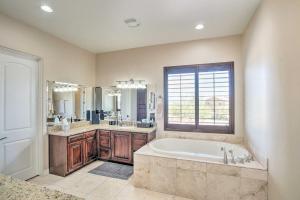 a large bathroom with a tub and a window at Scottsdale, Rio Verde Getaway Less Than 3 Mi to Golf Club! in Scottsdale +30 photos