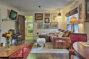 a living room with a couch and a table at Historic Ocean Grove Home - Walk to Beach! in Ocean Grove