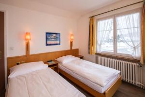 Posteľ alebo postele v izbe v ubytovaní Gasthof Enge Self Check-In Hotel