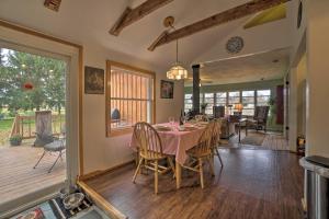 a dining room with a table and chairs at Vintage Farmhouse about 2 half Mi to Mount Pleasant Ski in Cambridge Springs