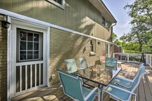 a patio with a table and chairs on a deck at Nashville Home with Deck about 5 Mi to Broadway and Downtown in Nashville