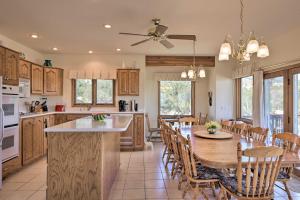a kitchen and dining room with a table and chairs at Large Salida Home with Mtn Views - 2 Mi to Downtown! in Salida