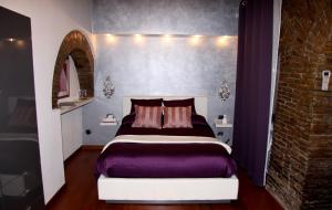 เตียงในห้องที่ Domus31 - Luxury House in Trastevere