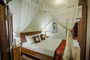 Postel nebo postele na pokoji v ubytování Abimana Ubud