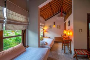 Voodi või voodid majutusasutuse Hoi An Chic - Green Retreat toas