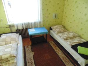 Voodi või voodid majutusasutuse Villa Turysta toas