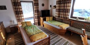 Postel nebo postele na pokoji v ubytování Apartment Alpenblick