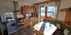 Kuchyň nebo kuchyňský kout v ubytování Apartment Alpenblick