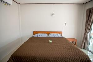 Postel nebo postele na pokoji v ubytování Lamai Resort