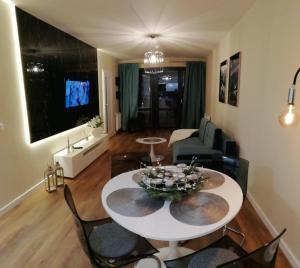 Posedenie v ubytovaní Apartament Silence Triventi Szmaragd